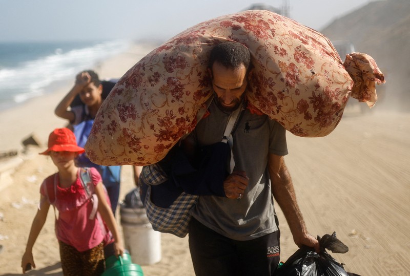 Sejumlah warga Palestina yang mengungsi di Gaza Selatan akibat agresi Israel, Senin (22/9/2025). Sejumlah warga Palestina yang mengungsi di Gaza Selatan akibat agresi Israel, Senin (22/9/2025). (REUTERS/Dawoud Abu Alkas)