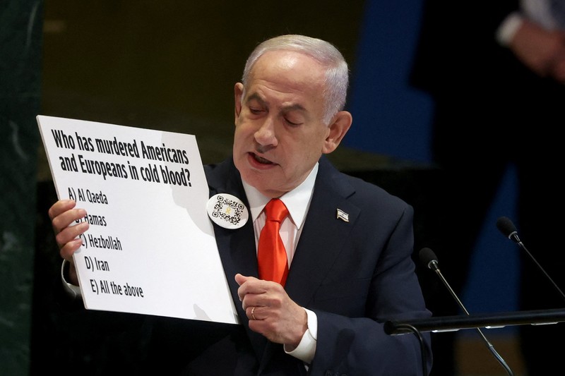 UN-ASSEMBLY/ A screen displays Israeli Prime Minister Benjamin Netanyahu during his address, at the 80th United Nations General Assembly (UNGA) at U.N. headquarters in New York City, U.S., September 26, 2025. REUTERS/Jeenah Moon