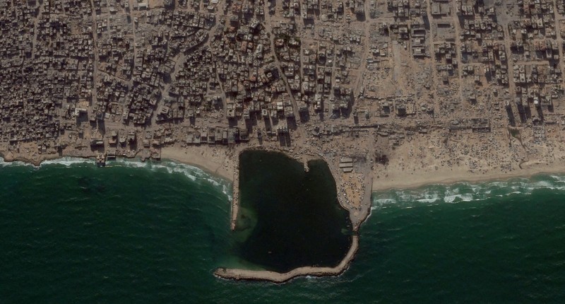 Dua tahun setelah konflik antara Israel dan Hamas pecah pada 7 Oktober 2023, citra satelit mengungkap kehancuran ekstensif di Jalur Gaza, Senin (13/10/2025). Dua tahun setelah konflik antara Israel dan Hamas pecah pada 7 Oktober 2023, citra satelit mengungkap kehancuran ekstensif di Jalur Gaza, Senin (13/10/2025). (via REUTERS/PLANET LABS PBC)