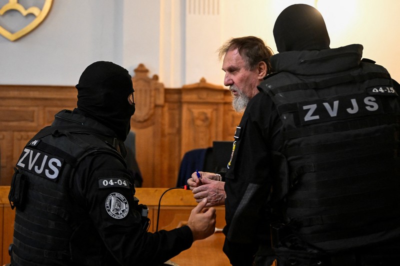 Juraj Cintula usai sidang putusan di Pengadilan Pidana Khusus, Banska Bystrica, Slovakia, Selasa (21/10/2025). (REUTERS/Radovan Stoklasa)/ Juraj Cintula usai sidang putusan di Pengadilan Pidana Khusus, Banska Bystrica, Slovakia, Selasa (21/10/2025). (REUTERS/Radovan Stoklasa)