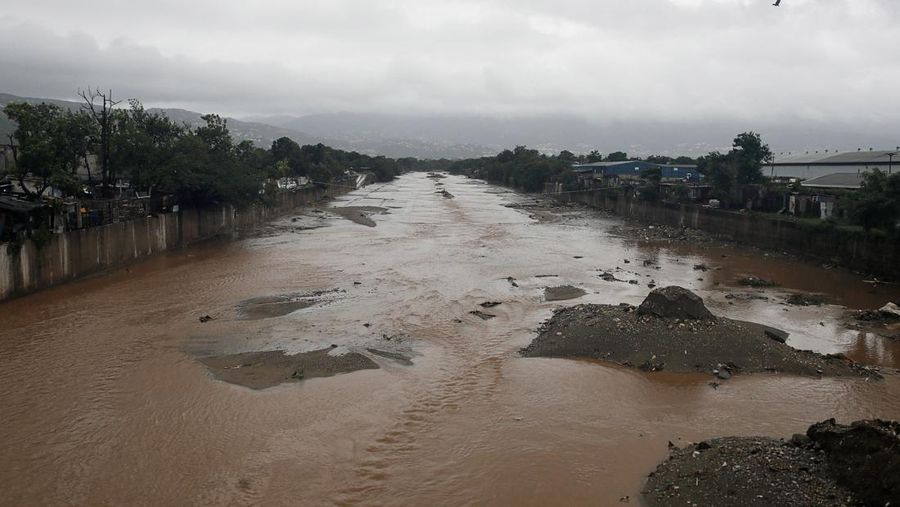 STORM-MELISSA/CUBA A man herds cattle along the coastline ahead of Hurricane Melissa's landfall, in Santiago de Cuba, Cuba, October 28, 2025. REUTERS/Norlys Perez     TPX IMAGES OF THE DAY