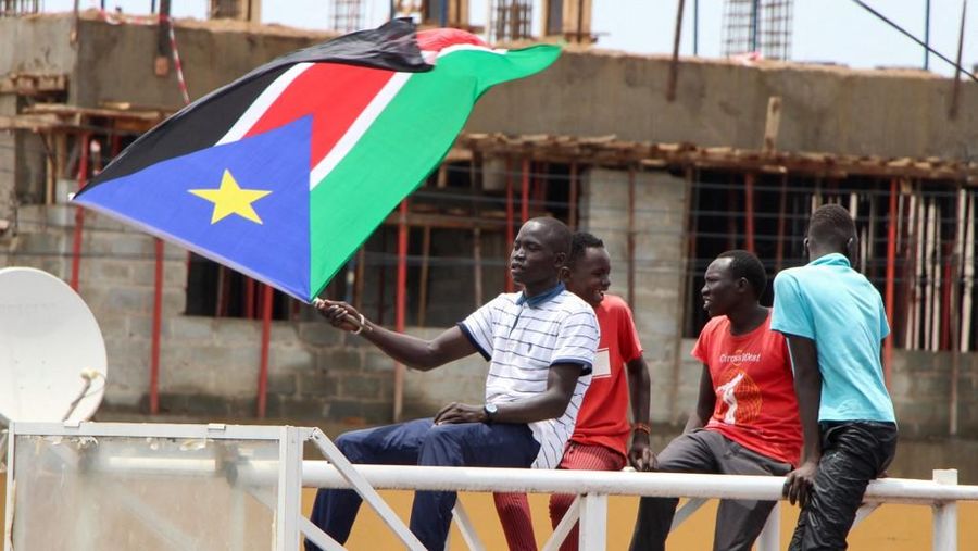 Bendera Sudan. (Photo by Peter Louis GUME / AFP)