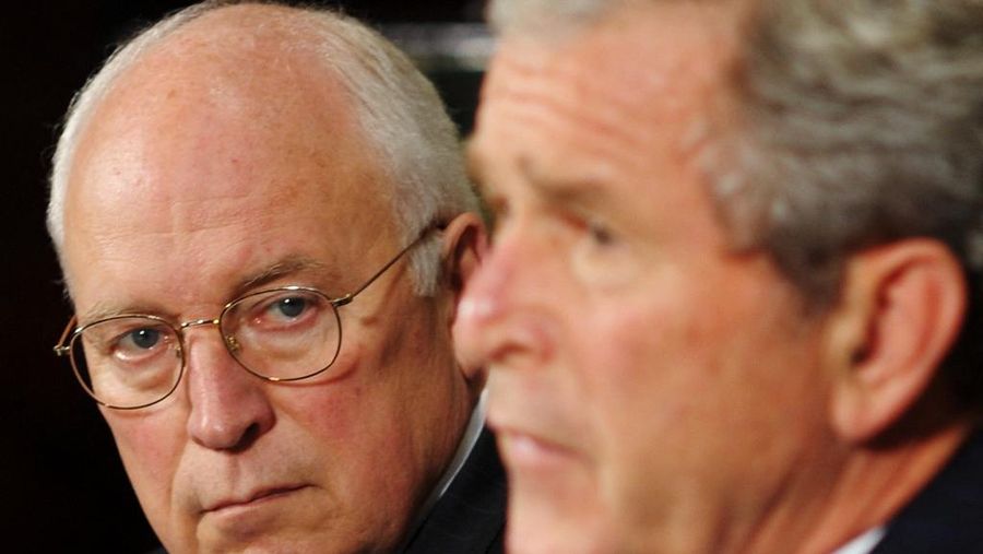 (FILES) Vice President Dick Cheney (L) watches as US President George W. Bush speaks during a briefing on US Midwest flooding on June 17, 2008 in the Roosevelt Room of the White House in Washington, DC. Dick Cheney, who became one of the most powerful vice presidents in US history as George W. Bushs number two during 9/11 and catastrophic wars in Afghanistan and Iraq, died on November 3, 2025. He was 84. (Photo by Mandel NGAN / AFP)