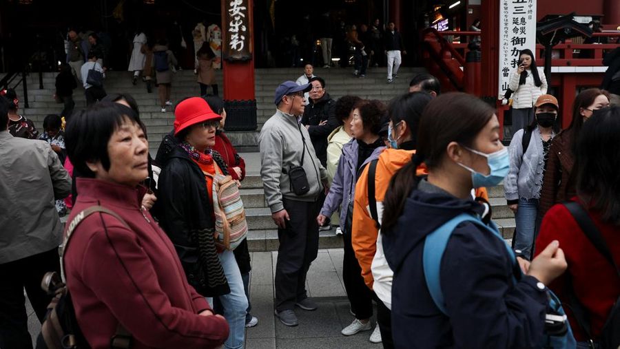 A Chinese chat message between a travel agency staff member and a customer reading 'I won't go to Japan', as a part of messages announcing trip cancellations from the customer, appears on a computer screen at East Japan International Travel Service Co. , a Tokyo-based travel agency, amid escalating tension between China and Japan, in Tokyo, Japan November 18, 2025.  REUTERS/Issei Kato
