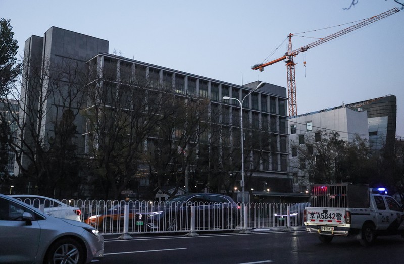 Cars drive past the Embassy of Japan in Beijing, China, November 18, 2025. REUTERS/Maxim Shemetov