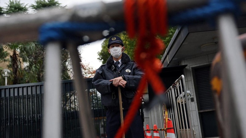 Cars drive past the Embassy of Japan in Beijing, China, November 18, 2025. REUTERS/Maxim Shemetov