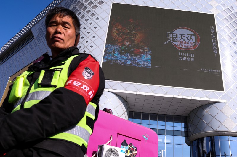 Cars drive past the Embassy of Japan in Beijing, China, November 18, 2025. REUTERS/Maxim Shemetov
