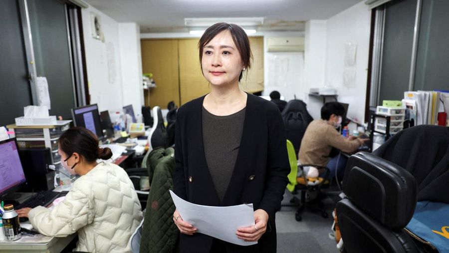 A Chinese chat message between a travel agency staff member and a customer reading 'I won't go to Japan', as a part of messages announcing trip cancellations from the customer, appears on a computer screen at East Japan International Travel Service Co. , a Tokyo-based travel agency, amid escalating tension between China and Japan, in Tokyo, Japan November 18, 2025.  REUTERS/Issei Kato