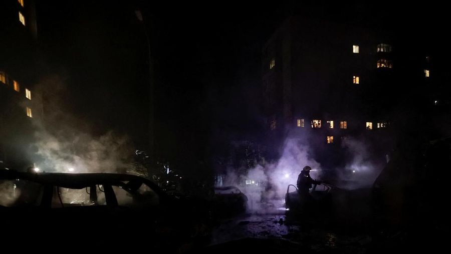 Rescuers evacuate a resident from the apartment building hit by a Russian drone strike, amid Russia's attack on Ukraine, in Kharkiv, Ukraine November 19, 2025. REUTERS/Sofiia Gatilova