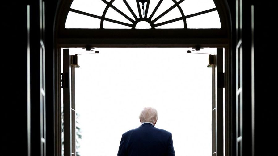 U.S. President Donald Trump walks to welcome Saudi Crown Prince and Prime Minister Mohammed bin Salman, at the White House in Washington, D.C., U.S., November 18, 2025. REUTERS/Evelyn Hockstein