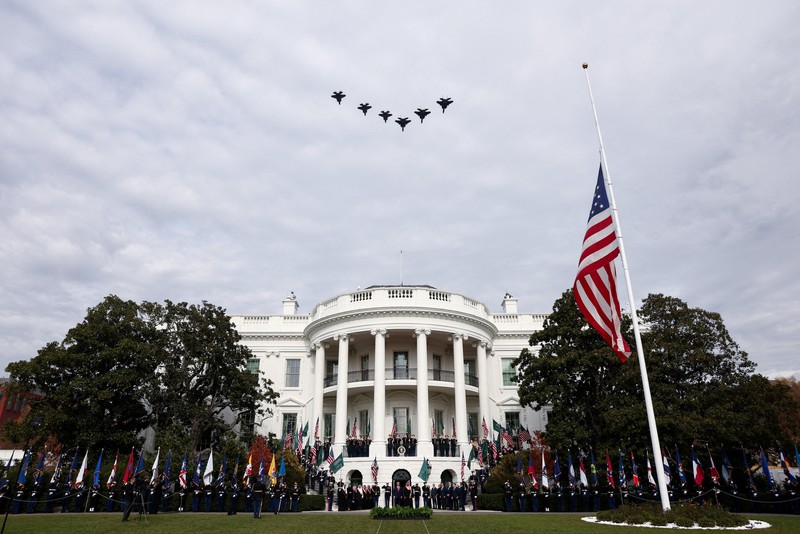 U.S. President Donald Trump and Saudi Crown Prince and Prime Minister Mohammed bin Salman watch a military flyover at the White House in Washington, D.C., U.S., November 18, 2025. REUTERS/Kevin Lamarque     TPX IMAGES OF THE DAY