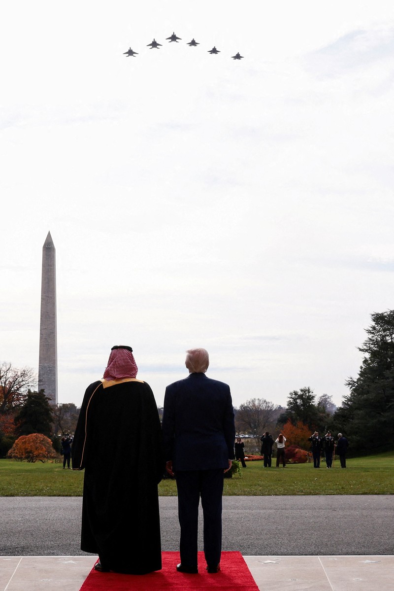 U.S. President Donald Trump and Saudi Crown Prince and Prime Minister Mohammed bin Salman watch a military flyover at the White House in Washington, D.C., U.S., November 18, 2025. REUTERS/Kevin Lamarque     TPX IMAGES OF THE DAY