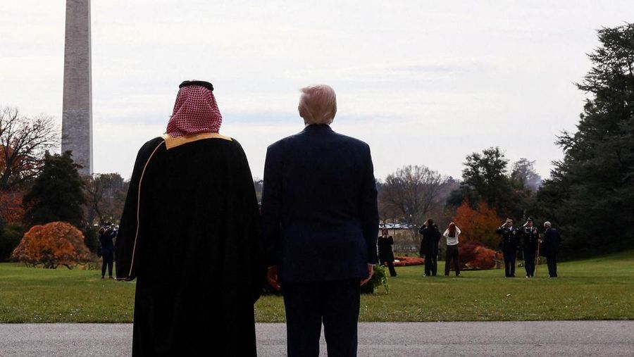 U.S. President Donald Trump and Saudi Crown Prince and Prime Minister Mohammed bin Salman watch a military flyover at the White House in Washington, D.C., U.S., November 18, 2025. REUTERS/Kevin Lamarque     TPX IMAGES OF THE DAY