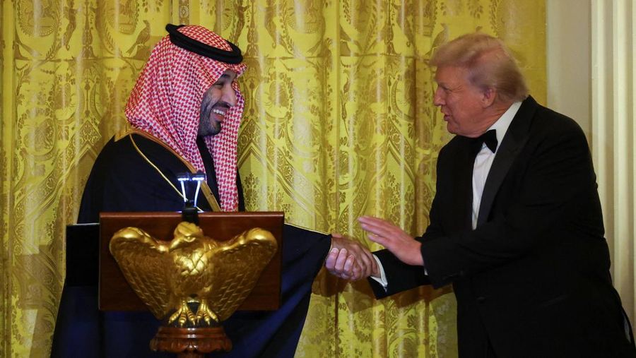 U.S. President Donald Trump greets Saudi Crown Prince and Prime Minister Mohammed bin Salman, during a dinner at the White House in Washington, D.C., U.S., November 18, 2025. REUTERS/Tom Brenner