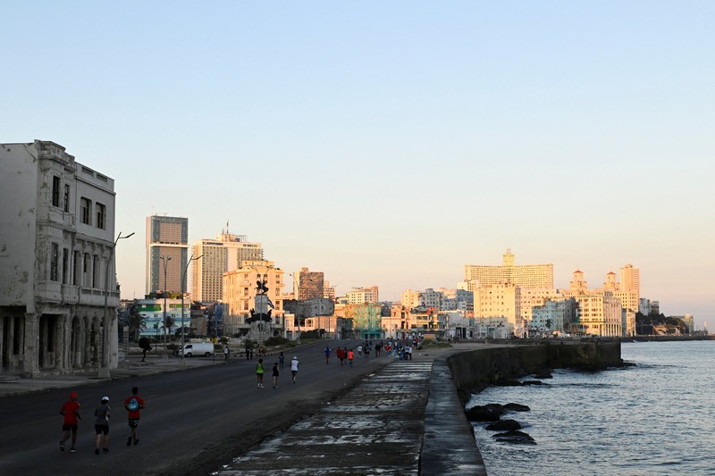 Competitors run during the 39th edition of the Marabana marathon in Havana, Cuba, November 16, 2025. REUTERS/Norlys Perez