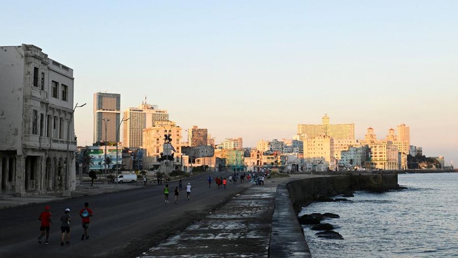 Competitors run during the 39th edition of the Marabana marathon in Havana, Cuba, November 16, 2025. REUTERS/Norlys Perez