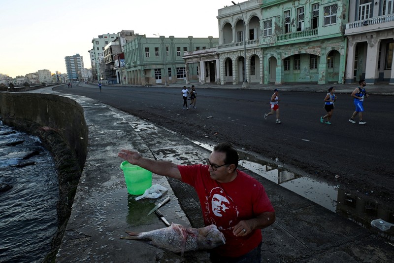Competitors run during the 39th edition of the Marabana marathon in Havana, Cuba, November 16, 2025. REUTERS/Norlys Perez