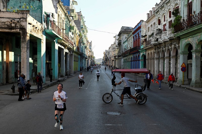 Competitors run during the 39th edition of the Marabana marathon in Havana, Cuba, November 16, 2025. REUTERS/Norlys Perez