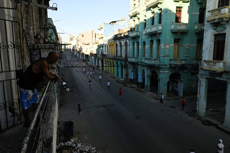Competitors run during the 39th edition of the Marabana marathon in Havana, Cuba, November 16, 2025. REUTERS/Norlys Perez