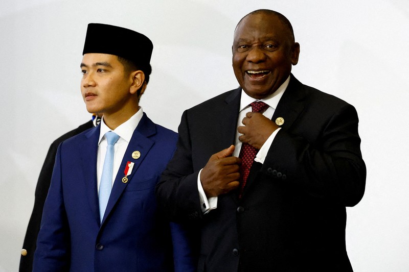 Indonesia's Vice President Gibran Rakabuming Raka and German Finance Minister and Vice Chancellor Lars Klingbeil attend a plenary session on the opening day of the G20 leaders' Summit at the Nasrec Expo Centre in Johannesburg, South Africa, November 22, 2025. REUTERS/Thomas Mukoya/Pool