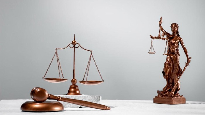 Ilustrasi simbol hukum dan keadilan. (Freepik)