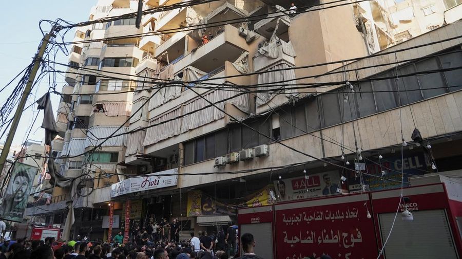 Members of the Lebanese army secure the area near the site of an Israeli strike, after Israeli military said on Sunday that it struck a militant from the Lebanese Iran-aligned Hezbollah group, in Beirut's southern suburbs, Lebanon November 23, 2025. REUTERS/Mohamed Azakir