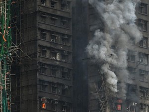 Hong Kong Luncurkan Penyelidikan Kriminal Atas Kebakaran Apartemen