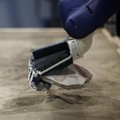 Asisten robot membantu para arkeolog menyusun lukisan dinding Pompeii. (REUTERS/Guglielmo Mangiapane)