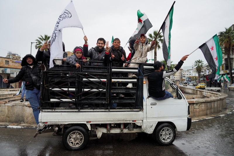 Perayaan ulang tahun pertama kejatuhan Bashar al-Assad di Lapangan Ummayad, Damaskus, Suriah, 8 Desember 2025. REUTERS/Yamam al Shaar