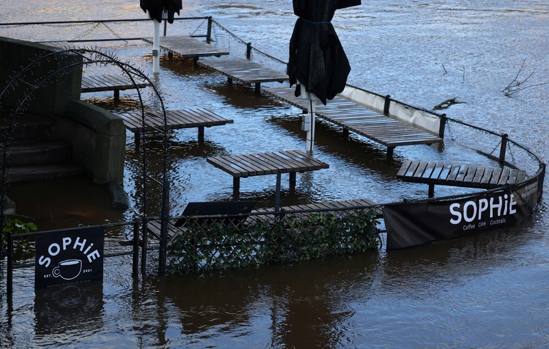 A drone view shows buildings near River Ouse, which burst its banks and partially flooded sections of nearby roads, in York, Britain, December 10, 2025. REUTERS/Phil Noble