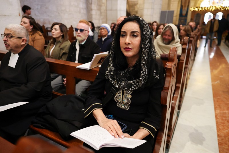 Palestinian scouts parade at Manger Square outside the Church of the Nativity in Bethlehem, in the Israeli-occupied West Bank, on Christmas Eve, December 24, 2025. REUTERS/Ammar Awad