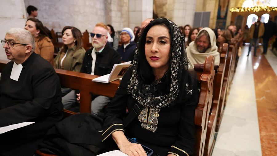 Palestinian scouts parade at Manger Square outside the Church of the Nativity in Bethlehem, in the Israeli-occupied West Bank, on Christmas Eve, December 24, 2025. REUTERS/Ammar Awad