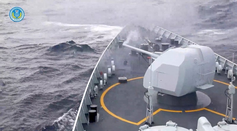 A ship fires a weapon during drills east of Taiwan, in this screenshot from a video released by the Eastern Theatre Command of China's People's Liberation Army (PLA) on December 29, 2025. Eastern Theatre Command/Handout via REUTERS  ATTENTION EDITORS - THIS IMAGE WAS PROVIDED BY A THIRD PARTY. MANDATORY CREDIT. NO RESALES. NO ARCHIVES.     TPX IMAGES OF THE DAY