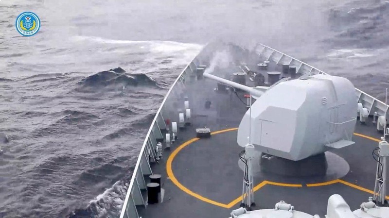 A ship fires a weapon during drills east of Taiwan, in this screenshot from a video released by the Eastern Theatre Command of China's People's Liberation Army (PLA) on December 29, 2025. Eastern Theatre Command/Handout via REUTERS  ATTENTION EDITORS - THIS IMAGE WAS PROVIDED BY A THIRD PARTY. MANDATORY CREDIT. NO RESALES. NO ARCHIVES.     TPX IMAGES OF THE DAY