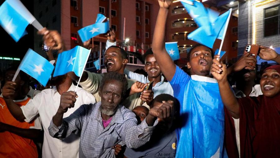 A demonstrator points to the white five‑pointed star on the Somali flag as Somalis attend a demonstration after Israel became the first country to formally recognise the self‑declared Republic of Somaliland as an independent and sovereign state, a decision that could reshape regional dynamics and test Somalia's longstanding opposition to secession, in the Hodan district of Mogadishu, Somalia, December 28, 2025. REUTERS/Feisal Omar