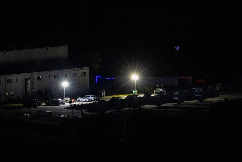 Personnel work on a U.S. Air Force F-35 Lightning II fighter jet parked on the tarmac at the former Roosevelt Roads naval base, amid tensions between the administration of U.S. President Donald Trump and the government of Venezuelan President Nicolas Maduro, in Ceiba, Puerto Rico, January 2, 2026. REUTERS/Eva Marie Uzcategui