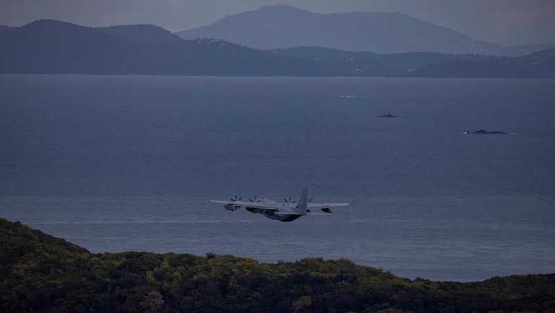 Personnel work on a U.S. Air Force F-35 Lightning II fighter jet parked on the tarmac at the former Roosevelt Roads naval base, amid tensions between the administration of U.S. President Donald Trump and the government of Venezuelan President Nicolas Maduro, in Ceiba, Puerto Rico, January 2, 2026. REUTERS/Eva Marie Uzcategui