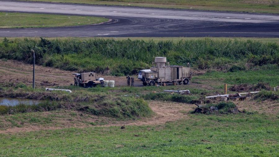 Personnel work on a U.S. Air Force F-35 Lightning II fighter jet parked on the tarmac at the former Roosevelt Roads naval base, amid tensions between the administration of U.S. President Donald Trump and the government of Venezuelan President Nicolas Maduro, in Ceiba, Puerto Rico, January 2, 2026. REUTERS/Eva Marie Uzcategui