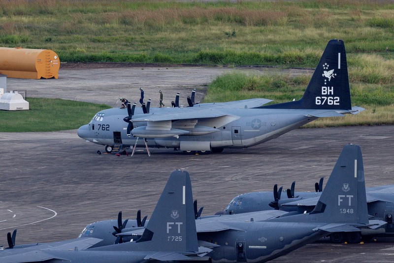 Personnel work on a U.S. Air Force F-35 Lightning II fighter jet parked on the tarmac at the former Roosevelt Roads naval base, amid tensions between the administration of U.S. President Donald Trump and the government of Venezuelan President Nicolas Maduro, in Ceiba, Puerto Rico, January 2, 2026. REUTERS/Eva Marie Uzcategui