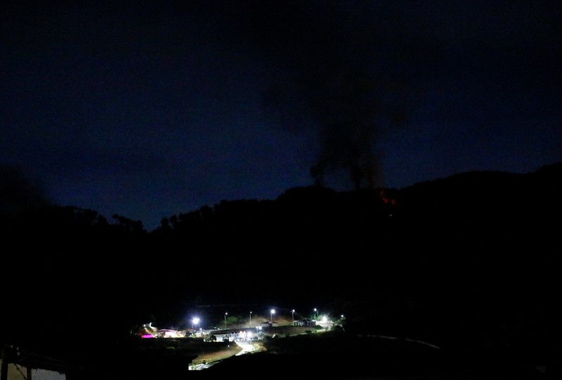 Helicopters fly past plumes of smoke rising from explosions, in Caracas, Venezuela, January 3, 2026 in this screen grab obtained from video obtained by Reuters. Video Obtained by Reuters/via REUTERS  THIS IMAGE HAS BEEN SUPPLIED BY A THIRD PARTY. NO RESALES. NO ARCHIVES. NEWS USE ONLY. THIS PICTURE WAS PROCESSED BY REUTERS TO ENHANCE QUALITY. AN UNPROCESSED VERSION HAS BEEN PROVIDED SEPARATELY.  VERIFICATION: - Mountains, towers and buildings match satellite and file imagery of Caracas  - Date verified by multiple corroborating videos of strikes on Caracas      TPX IMAGES OF THE DAY