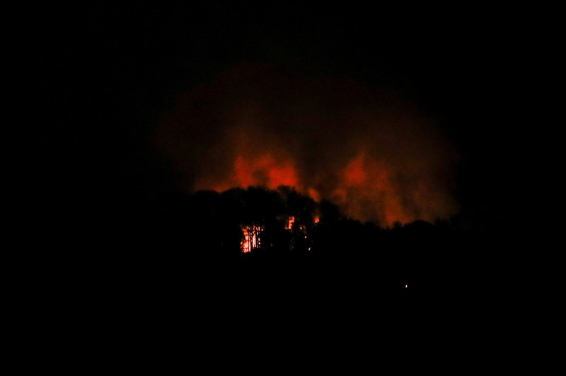 Helicopters fly past plumes of smoke rising from explosions, in Caracas, Venezuela, January 3, 2026 in this screen grab obtained from video obtained by Reuters. Video Obtained by Reuters/via REUTERS  THIS IMAGE HAS BEEN SUPPLIED BY A THIRD PARTY. NO RESALES. NO ARCHIVES. NEWS USE ONLY. THIS PICTURE WAS PROCESSED BY REUTERS TO ENHANCE QUALITY. AN UNPROCESSED VERSION HAS BEEN PROVIDED SEPARATELY.  VERIFICATION: - Mountains, towers and buildings match satellite and file imagery of Caracas  - Date verified by multiple corroborating videos of strikes on Caracas      TPX IMAGES OF THE DAY