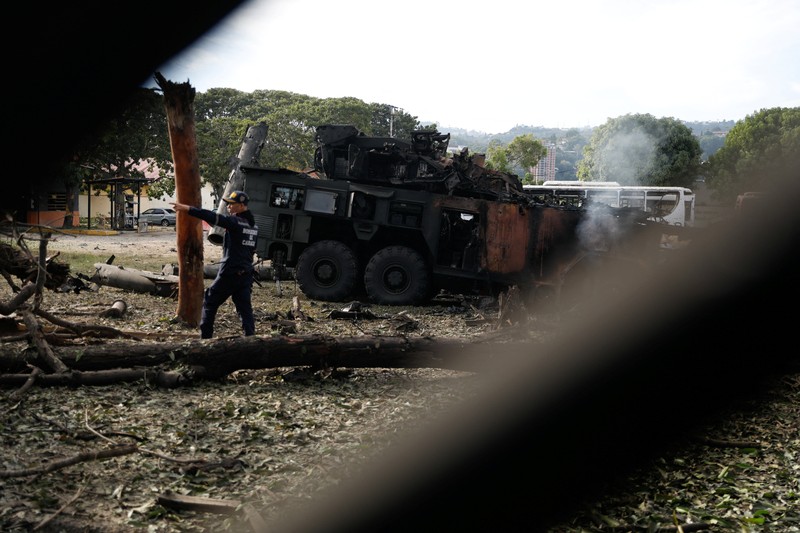 A combination picture shows satellite images of military buildings and equipment at Fort Tiuna before the U.S. strikes, in Caracas, Venezuela, December 22, 2025 (left), and a closer view of destroyed vehicles and equipment at Fort Tiuna after the U.S. strikes, in Caracas, Venezuela, January 3, 2026 (right).   &copy;2026 Vantor/Handout via REUTERS THIS IMAGE HAS BEEN SUPPLIED BY A THIRD PARTY. MANDATORY CREDIT. NO RESALES. NO ARCHIVES. DO NOT OBSCURE LOGO.
