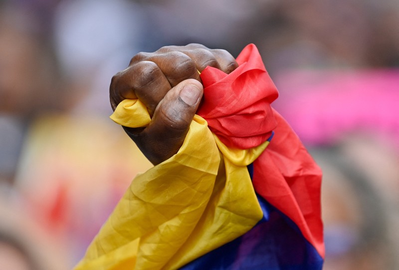 Pendukung Presiden Venezuela Nicolas Maduro menggelar demonstrasi di Caracas pada Senin (5/1/2025), menuntut pembebasan Maduro dan istrinya yang ditangkap oleh pasukan Amerika Serikat (AS) dan dibawa ke penjara di New York. (REUTERS/Maxwell Briceno)