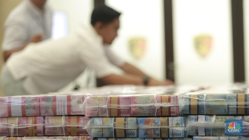 Sejumlah 2 unit mobil sitaan sebagai barang bukti Pengungkapan Kasus Illegal_Access, Pencucian Uang Yang Berasal Dari Perjudian Online di Gedung Awaloedin Djamin Bareskrim Polri, Jakarta, Rabu, (7/1/2026). (CNBC Indonesia/Muhamad Sabki)