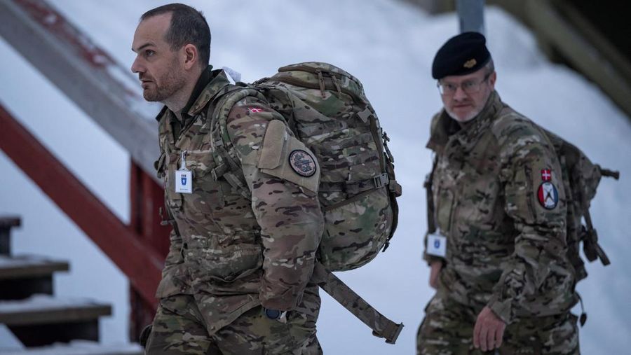 Danish soldiers walk in front of Joint Arctic Command in Nuuk, Greenland, January 16, 2026. REUTERS/Marko Djurica