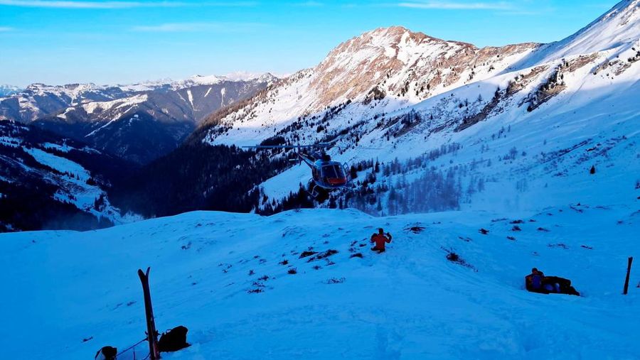 Rescue workers stand near the site where four skiers were killed in an avalanche in Pongau district, Austria, January 17, 2026. BERGRETTUNG SALZBURG/ Handout via REUTERS  THIS IMAGE HAS BEEN SUPPLIED BY A THIRD PARTY