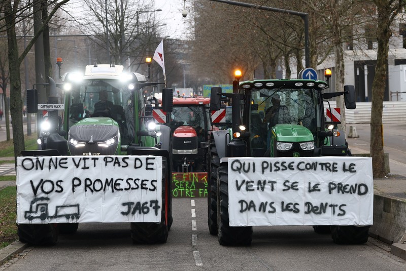 French farmers from FNSEA and Jeunes Agriculteurs farm unions drive their tractors along a road near European Parliament during a demonstration to protest against the EU-Mercosur free trade agreement in Strasbourg, France, January 20, 2026. REUTERS/Yves Herman