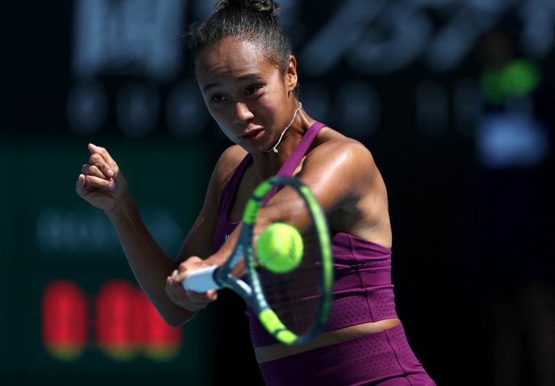 Petenis Indonesia Janice Tjen beraksi pada pertandingan putaran pertama melawan Leylah Fernandez dari Kanada di Australia Terbuka, Melbourne Park, Melbourne, Australia, 20 Januari 2026. (REUTERS/Hollie Adams)