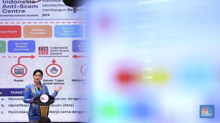 Otoritas Jasa Keuangan (OJK) bersama dengan Kementerian/Lembaga anggota Satgas PASTI melaksanakan Penyerahan Dana Masyarakat Korban Scam yang Berhasil Diselamatkan Melalui Sinergi dan Kolaborasi Indonesia Anti Scam Centre (IASC), di Gedung AA Maramis, Jakarta, Rabu (21/1/2026). (CNBC Indonesia/Tri Susilo)