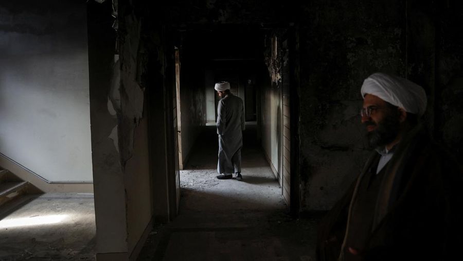 Bus-bus yang dibakar selama protes di Iran, di Teheran, Iran, 21 Januari 2026. (Majid Asgaripour/WANA (West Asia News Agency) via REUTERS)